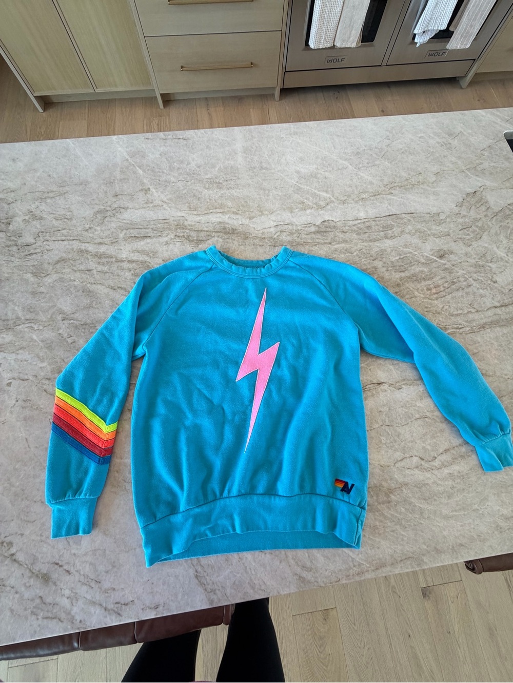 Aviator Nation Turquoise Sweatshirt with Pink Lightning and Rainbow Sleeve